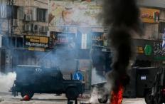 الاحتلال يزيل صور شهداء وأسرى بطولكرم