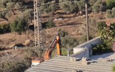 مستوطنون يجرفون أراضي في قرية أم صفا شمال غرب رام الله