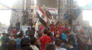 بالصور..اصابة عشرات المصريين في اشتباكات بين مؤيدي ومعارضي مرسي