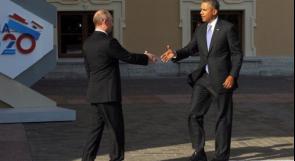 بوتين يصافح اوباما لدى استقباله