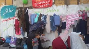 خاص لـ "وطن" بالفيديو.. حائط الخير في غزة .. ملتقى المتبرعين بالملابس والمحتاجين لها