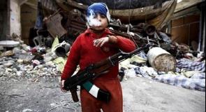 طفل في السابعة يقاتل مع الجيش الحر