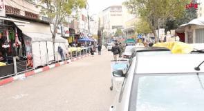 كساد بالحركة التجارية في مدينة الخليل جراء الحواجز والإغلاقات