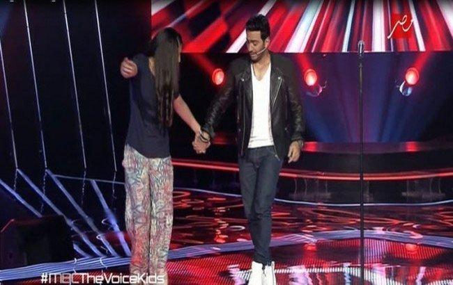 بالفيديو.. الطفلة الفلسطينية ميرال عياد تبهر لجنة "ذا فويس" بالفيديو.. الطفلة الفلسطينية ميرال عياد تبهر لجنة "ذا فويس"