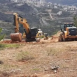 مستوطنون يشقون طريقاً استيطانياً في نعلين غرب رام الله