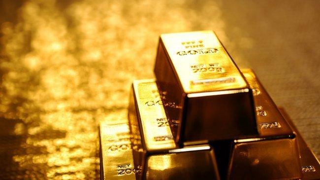 الذهب يهبط مع صعود الدولار من أدنى مستوى منذ ديسمبر 2014