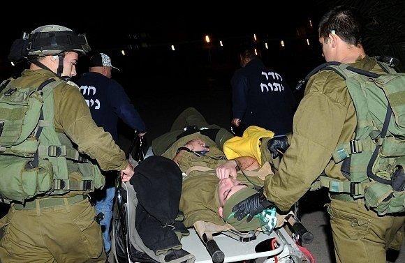 ضابط إسرائيلي يكشف عن مقتل جندي وإصابة 10 مستعربين بعملية خزاعة خلال هجوم2014