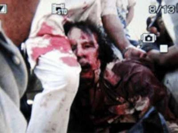 تقرير أممي: القذافي ونجله ماتا في ظروف غامضة والثوار ارتبكوا جرائم حرب